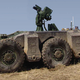 Image for article titled DARPA's Crusher Drives Itself, Laughs at Your Puny "Traffic"